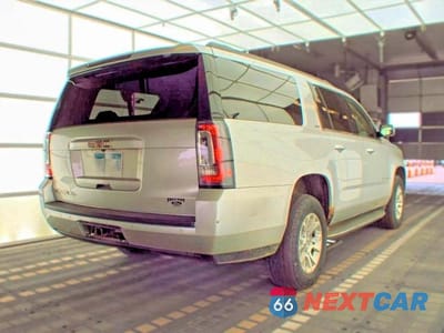 Czwarte zdjęcie samochodu z boku: 2015 GMC YUKON XL K1500 SLT VIN:1GKS2HKCXFR645238 - miniatura