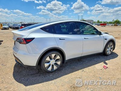 Trzecie zdjęcie samochodu z tyłu: 2022 TESLA MODEL Y VIN:7SAYGAEE2NF313510 - miniatura