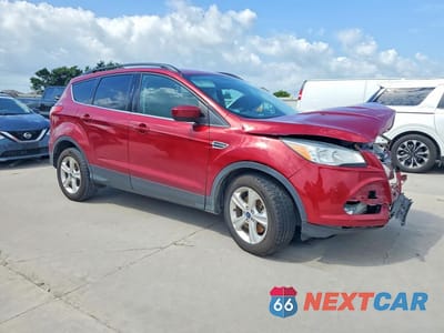Czwarte zdjęcie samochodu z boku: 2014 FORD ESCAPE SE VIN:1FMCU0G93EUE51831 - miniatura