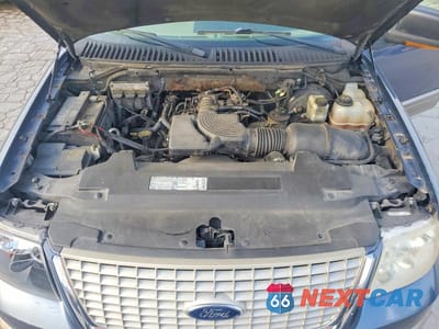 Zdjęcie 12 z 13 samochodu: 2003 FORD EXPEDITION EDDIE BAUER VIN:1FMFU17L63LB06701 - miniatura