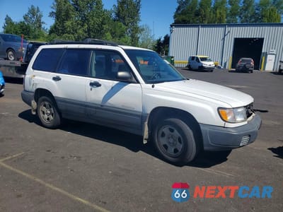 Czwarte zdjęcie samochodu z boku: 1999 SUBARU FORESTER L VIN:JF1SF6355XH718548 - miniatura