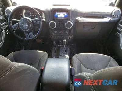 Zdjęcie 8 z 12 samochodu: 2014 JEEP WRANGLER UNLIMITED SAHARA VIN:1C4BJWEGXEL324111 - miniatura