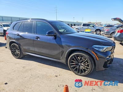 Czwarte zdjęcie samochodu z boku: 2021 BMW X5 M50I VIN:5UXJU4C03M9H40978 - miniatura