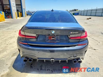 Zdjęcie 6 z 12 samochodu: 2020 BMW M340I VIN:3MW5U7J02L8B23386 - miniatura