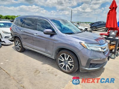 Czwarte zdjęcie samochodu z boku: 2021 HONDA PILOT TOURING VIN:5FNYF5H92MB039164 - miniatura