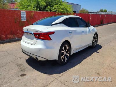 Czwarte zdjęcie samochodu z boku: 2017 NISSAN MAXIMA PLATINUM VIN:1N4AA6APXHC420087 - miniatura