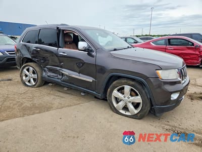 Czwarte zdjęcie samochodu z boku: 2012 JEEP GRAND CHEROKEE OVERLAND VIN:1C4RJFCT8CC265250 - miniatura