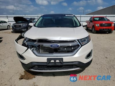 Piąte zdjęcie samochodu w środku: 2016 FORD EDGE TITANIUM VIN:2FMPK4K83GBC66393 - miniatura