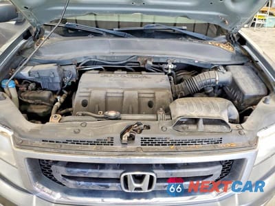 Zdjęcie 11 z 12 samochodu: 2011 HONDA RIDGELINE RT VIN:5FPYK1F28BB003218 - miniatura