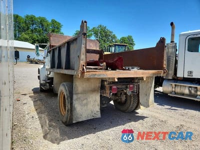 Trzecie zdjęcie samochodu z tyłu: 1999 INTERNATIONAL 4700 DUMP TRUCK VIN:1HTSCAAP5XH626160 - miniatura