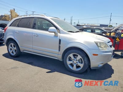 Czwarte zdjęcie samochodu z boku: 2015 CHEVROLET CAPTIVA LTZ VIN:3GNAL4EK5FS507157 - miniatura