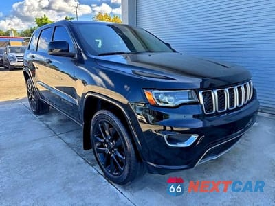 Czwarte zdjęcie samochodu z boku: 2021 JEEP GRAND CHEROKEE LAREDO VIN:1C4RJEAGXMC657311 - miniatura