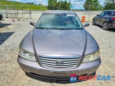 Piąte zdjęcie samochodu w środku: 2006 HYUNDAI AZERA SE VIN:KMHFC46FX6A085934 - miniatura