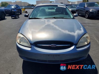 Piąte zdjęcie samochodu w środku: 2000 FORD TAURUS SES VIN:1FAFP55S7YA212273 - miniatura