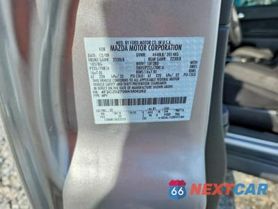 Zdjęcie 13 z 13 samochodu: 2009 MAZDA TRIBUTE VIN:4F2CZ02709KM06262 - miniatura