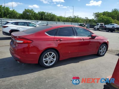 Trzecie zdjęcie samochodu z tyłu: 2018 FORD FUSION SE VIN:3FA6P0HD8JR284787 - miniatura