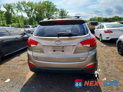 Zdjęcie 6 z 12 samochodu: 2012 HYUNDAI TUCSON GLS VIN:KM8JUCAC1CU415808 - miniatura