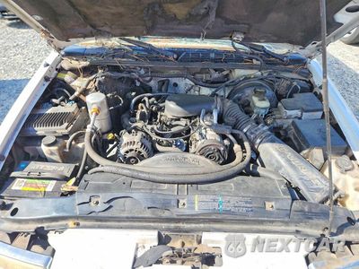 Zdjęcie 12 z 13 samochodu: 1999 CHEVROLET BLAZER VIN:1GNCS18W6XK139061 - miniatura