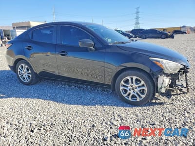 Czwarte zdjęcie samochodu z boku: 2016 SCION IA BASE VIN:3MYDLBZV0GY143387 - miniatura