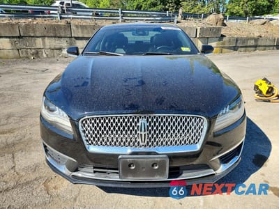 Piąte zdjęcie samochodu w środku: 2017 LINCOLN MKZ RESERVE VIN:3LN6L5F96HR662337 - miniatura