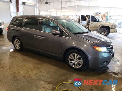 Czwarte zdjęcie samochodu z boku: 2016 HONDA ODYSSEY EXL VIN:5FNRL5H65GB143025 - miniatura