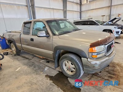 Czwarte zdjęcie samochodu z boku: 1999 GMC NEW SIERRA K1500 VIN:1GTEK19T3XE534688 - miniatura