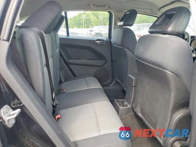 Zdjęcie 11 z 13 samochodu: 2009 DODGE CALIBER SXT VIN:1B3HB48AX9D171170 - miniatura