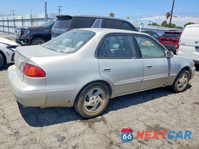 Trzecie zdjęcie samochodu z tyłu: 2002 TOYOTA COROLLA LE VIN:1NXBR12E52Z584769 - miniatura