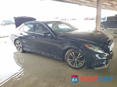 Czwarte zdjęcie samochodu z boku: 2016 MERCEDES-BENZ E 250 BLUETEC VIN:WDDHF0EB3GB243771 - miniatura