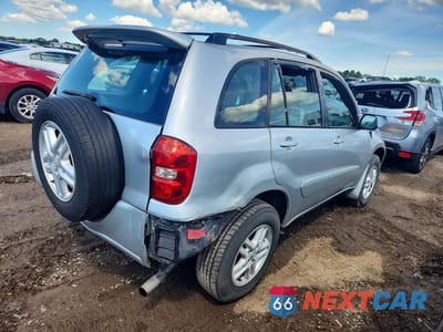 Trzecie zdjęcie samochodu z tyłu: 2001 TOYOTA RAV4 BASE VIN:JTEHH20V710102394 - miniatura
