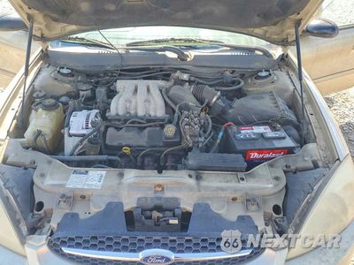 Zdjęcie 11 z 12 samochodu: 2000 FORD TAURUS LX VIN:1FAFP5221YG248543 - miniatura