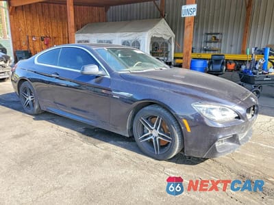 Czwarte zdjęcie samochodu z boku: 2012 BMW 650 XI VIN:WBALX5C57CC894124 - miniatura