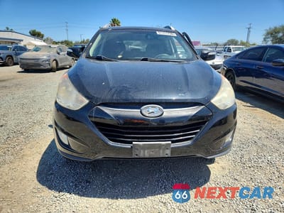Piąte zdjęcie samochodu w środku: 2013 HYUNDAI TUCSON GLS VIN:KM8JU3ACXDU712836 - miniatura