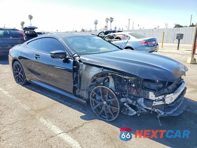 Czwarte zdjęcie samochodu z boku: 2019 BMW M850XI VIN:WBABC4C51KBU96042 - miniatura