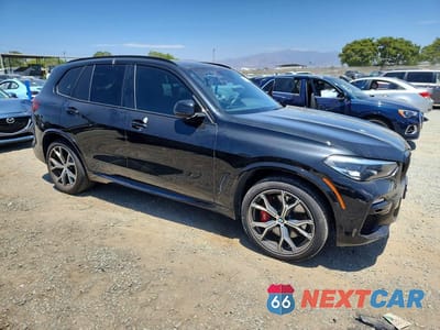 Czwarte zdjęcie samochodu z boku: 2021 BMW X5 XDRIVE45E VIN:5UXTA6C05M9E28447 - miniatura