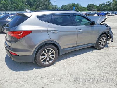 Trzecie zdjęcie samochodu z tyłu: 2014 HYUNDAI SANTA FE SPORT 2.0T VIN:5XYZU3LA2EG229332 - miniatura