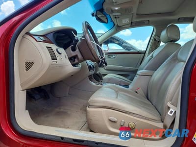 Zdjęcie 7 z 12 samochodu: 2006 CADILLAC DTS VIN:1G6KD57Y96U234924 - miniatura