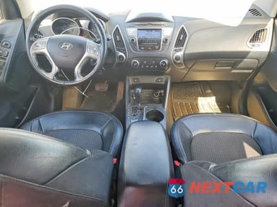 Zdjęcie 8 z 12 samochodu: 2013 HYUNDAI TUCSON GLS VIN:KM8JUCAC5DU608917 - miniatura