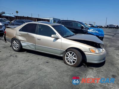 Czwarte zdjęcie samochodu z boku: 2001 TOYOTA CAMRY LE V6 VIN:JT2BF22K010310113 - miniatura