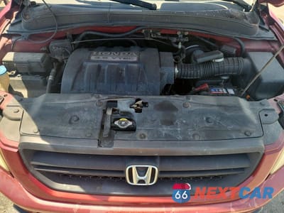 Zdjęcie 12 z 13 samochodu: 2005 HONDA PILOT EXL VIN:2HKYF18595H535992 - miniatura