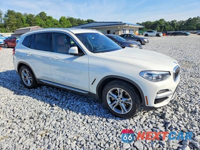 Czwarte zdjęcie samochodu z boku: 2020 BMW X3 XDRIVE30E VIN:5UXTS1C06L9D30607 - miniatura