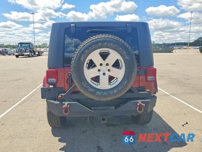 Zdjęcie 6 z 13 samochodu: 2008 JEEP WRANGLER UNLIMITED SAHARA VIN:1J4GA59178L651005 - miniatura