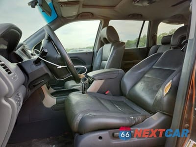 Zdjęcie 7 z 14 samochodu: 2007 HONDA PILOT EXL VIN:2HKYF18567H527321 - miniatura