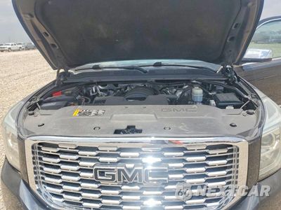 Zdjęcie 12 z 13 samochodu: 2018 GMC YUKON XL DENALI VIN:1GKS2HKJ1JR343408 - miniatura