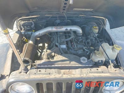 Zdjęcie 11 z 12 samochodu: 2003 JEEP WRANGLER COMMANDO VIN:1J4FA39S33P323221 - miniatura