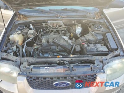 Zdjęcie 12 z 13 samochodu: 2007 FORD ESCAPE XLT VIN:1FMYU03137KA06543 - miniatura