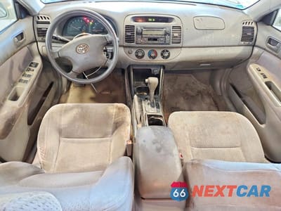 Zdjęcie 8 z 12 samochodu: 2002 TOYOTA CAMRY LE VIN:JTDBE32K820045555 - miniatura