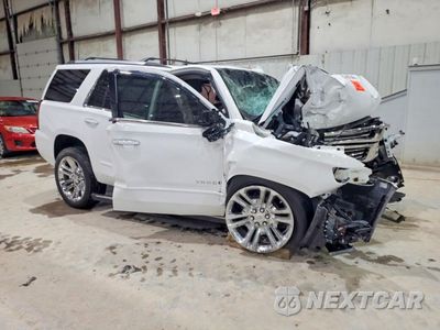 Czwarte zdjęcie samochodu z boku: 2020 CHEVROLET TAHOE K1500 PREMIER VIN:1GNSKCKJ0LR193770 - miniatura