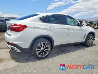 Trzecie zdjęcie samochodu z tyłu: 2019 BMW X6 SDRIVE35I VIN:5UXKU0C53K0H98843 - miniatura