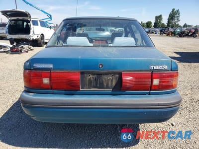 Zdjęcie 6 z 12 samochodu: 1994 MAZDA PROTEGE DX VIN:JM1BG2244R0736467 - miniatura